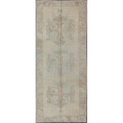 Faded Vintage Turkish Oushak Runner with Vertical Medallions in Tan and Taupe Faded Vintage Turkish Oushak Runner with Vertical Medallions in Tan and Taupe