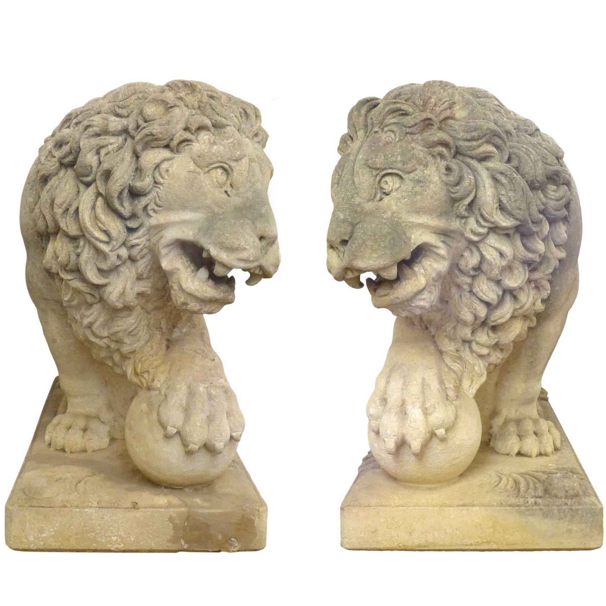 A fantastic pair of Italian, life-sized, carved-limestone, lion statues. Monumental works in the neoclassical style with masterful, expressive detail throughout: thick, flowing manes; exposed ribs and flexed musculature; powerful paws and fierce