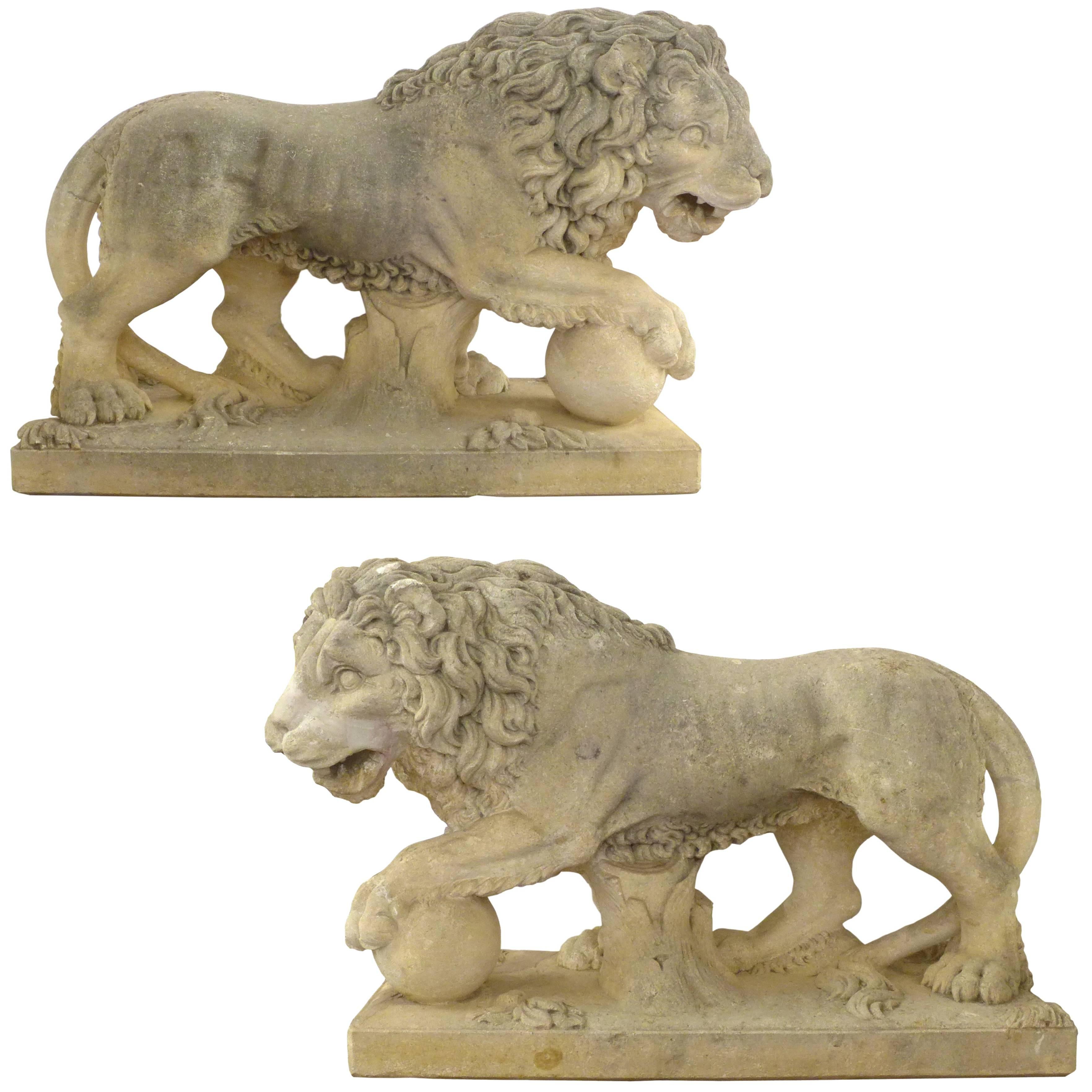 Pair of Italian Life-Sized Carved Limestone Lion Statues For Sale