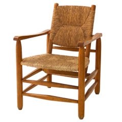 Fauteuil « Paille » de Charlotte Perriand, bois massif et paille, 1935, France