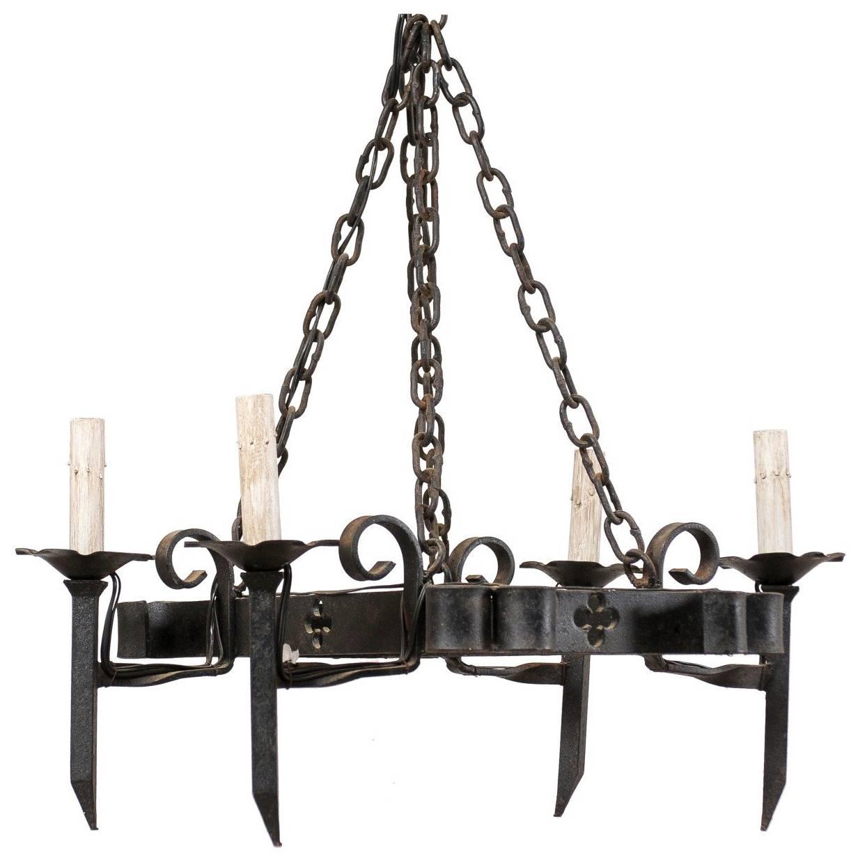 Vintage French Forged Iron Black Chandelier with Pierced Clover Motif Pattern