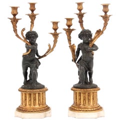 Substantial Pair of French Patinated and Gilt Bronze Figural Candelabra