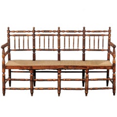 19th Century American Rustic Bench with Spindled Back and Woven Seat