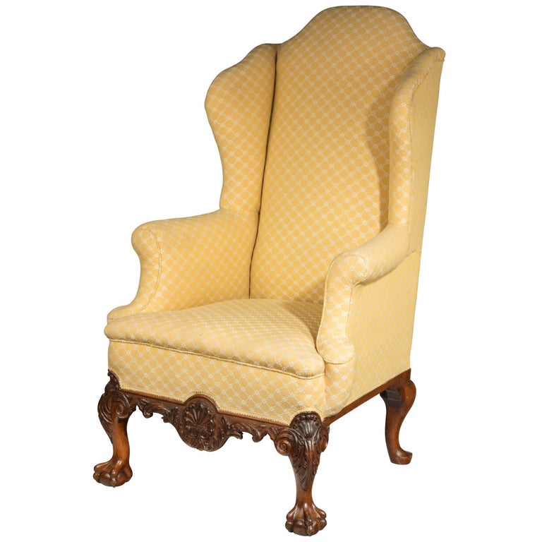 Queen Anne Style Irish Mahogany Framed Wing Chair Terminating in Paw