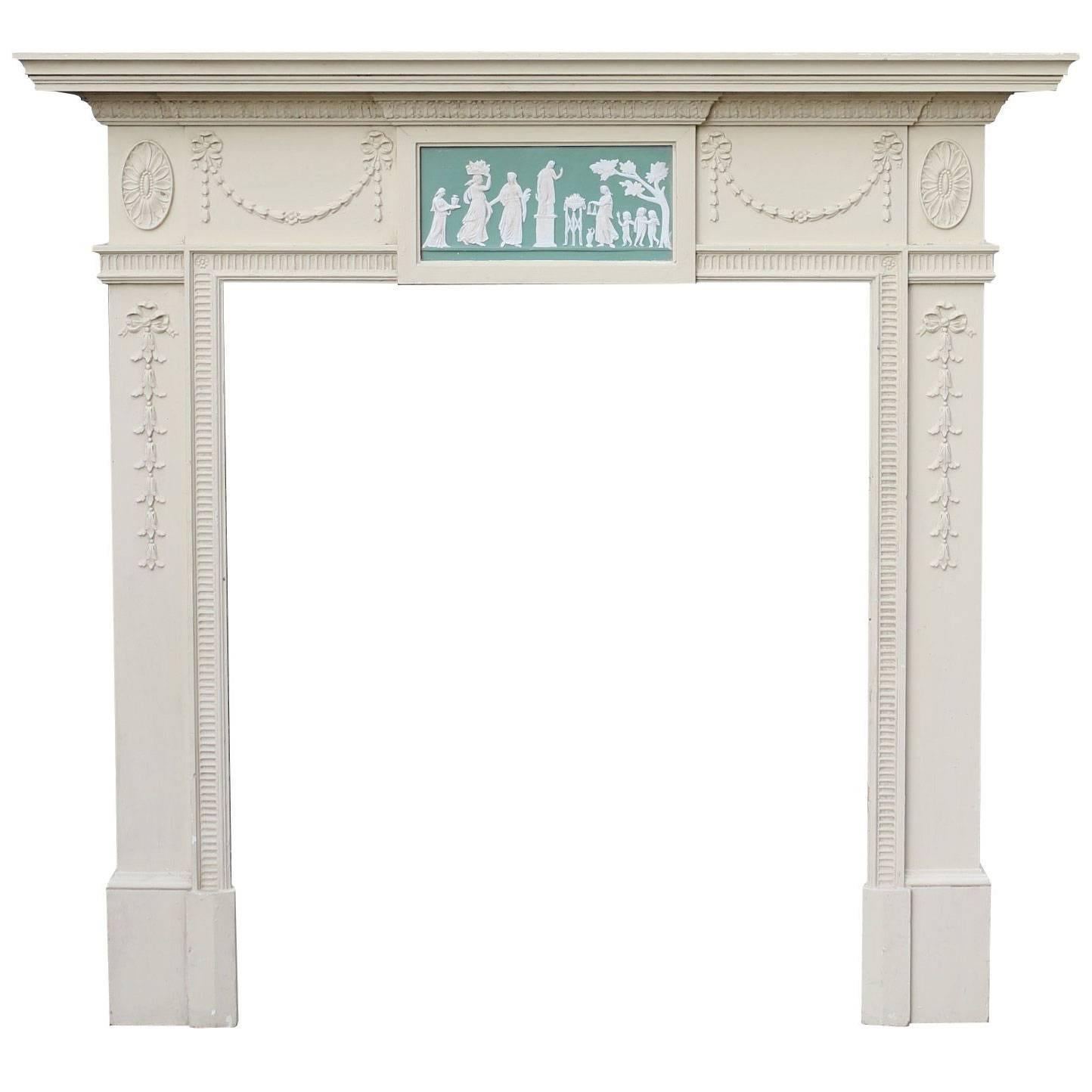 Early 20th Century Painted Pine Fire Surround with Wedgewood Style Plaque