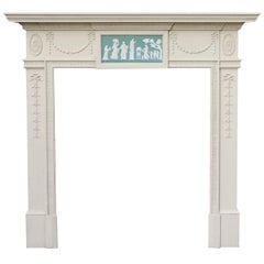 Antique Early 20th Century Painted Pine Fire Surround with Wedgewood Style Plaque