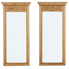 Pair of 20th century carved pine pier mirrors