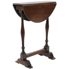 Antique English 1870s Petite Turned Oak Drop-Leaf, Round Top Table with Trestle Base