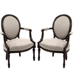 Pair of French Louis XVI Oval Back Upholstered Armchairs