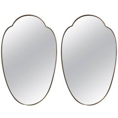 A pair of large brass 1950s Italian mirrors