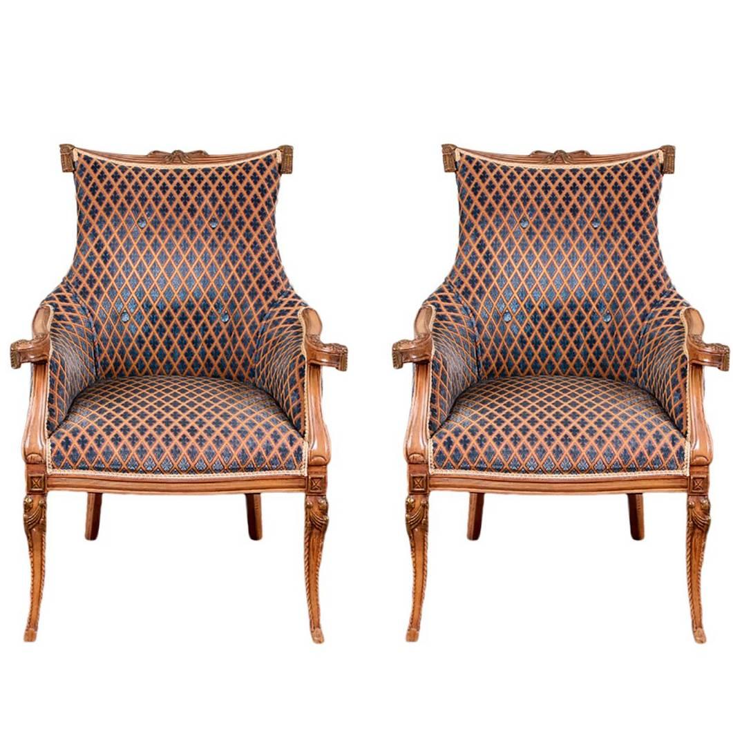 Pair of Hollywood Regency Carved Fireside Chairs