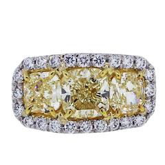 Triple Stone 2.94 Carat Fancy Yellow Cushion Cut Diamond Gold Platinum Ring
