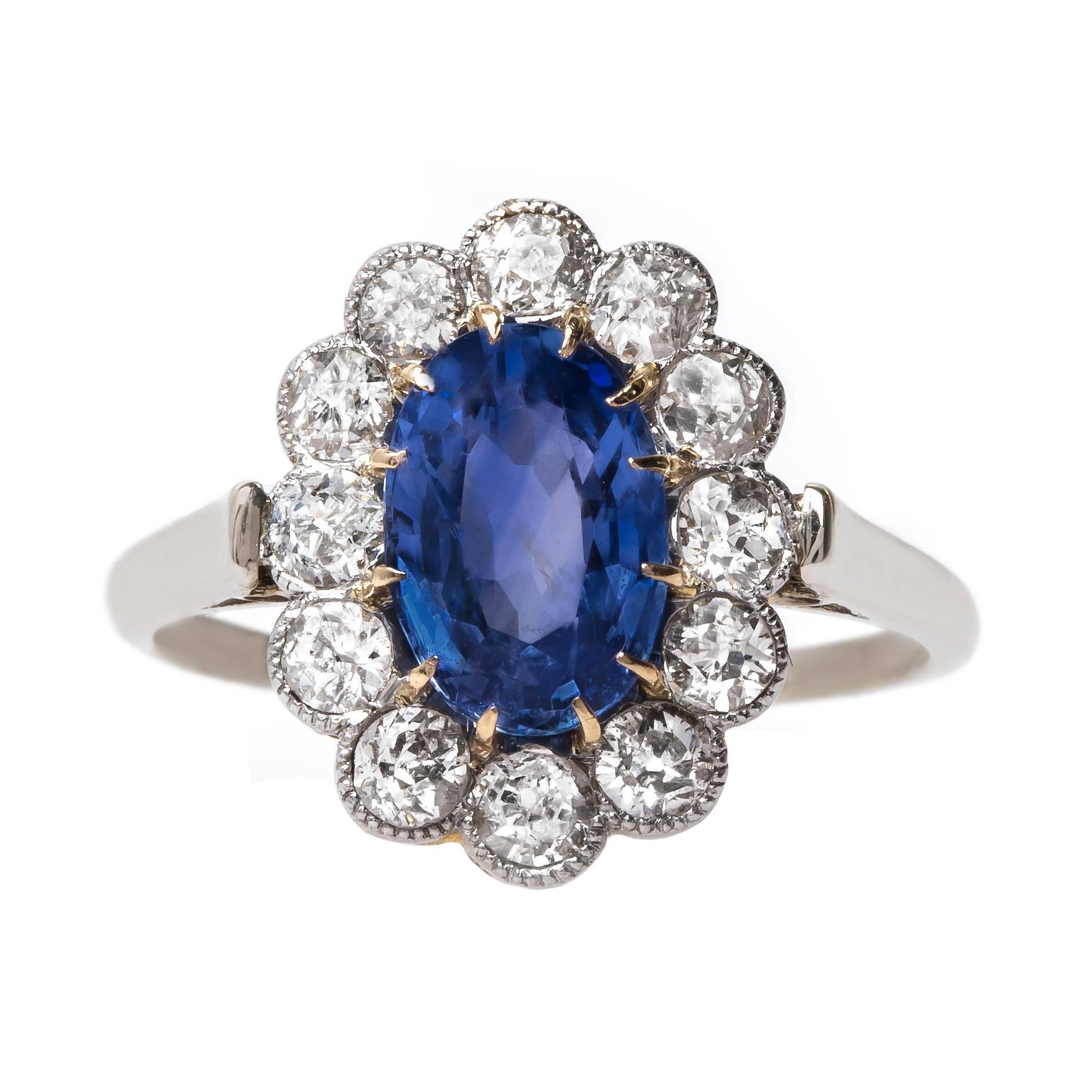 Exceptional Victorian Engagement Ring with Unheated Sapphire and Diamond Halo