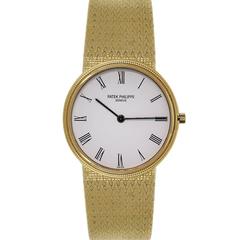 Patek Philippe Yellow Gold Calatrava White Roman Dial Quartz Wristwatch