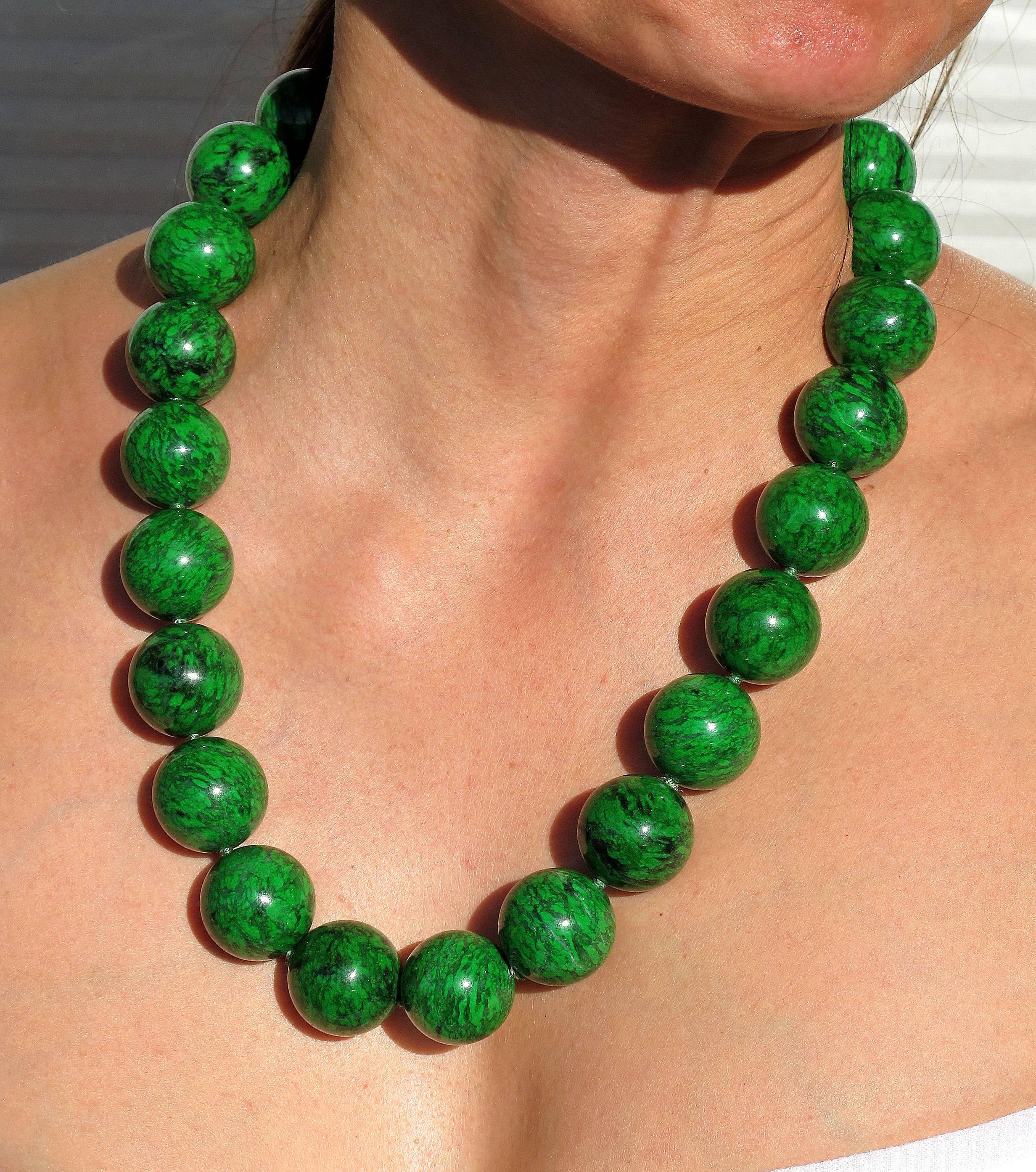 Beautiful and Rare 25 natural, genuine untreated Maw-Sit-Sit Jade beads, each measuring approx. 23- 24 mm in diameter; approx. length 24.5”= 62.5 cm; approx. total weight: 490 grams Striking, Chic and Timeless…for you to Enjoy! 
