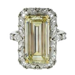 GIA 4.41 Carat Emerald Cut Fancy Light Yellow Diamond Gold Platinum Halo Ring