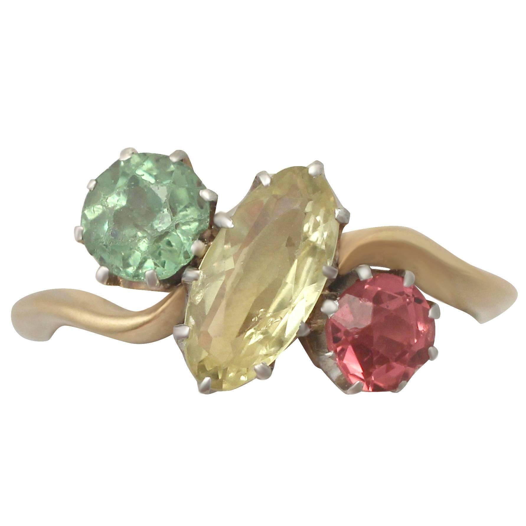1910s Sapphire, Garnet and Tourmaline and 18k Yellow Gold Trilogy Ring