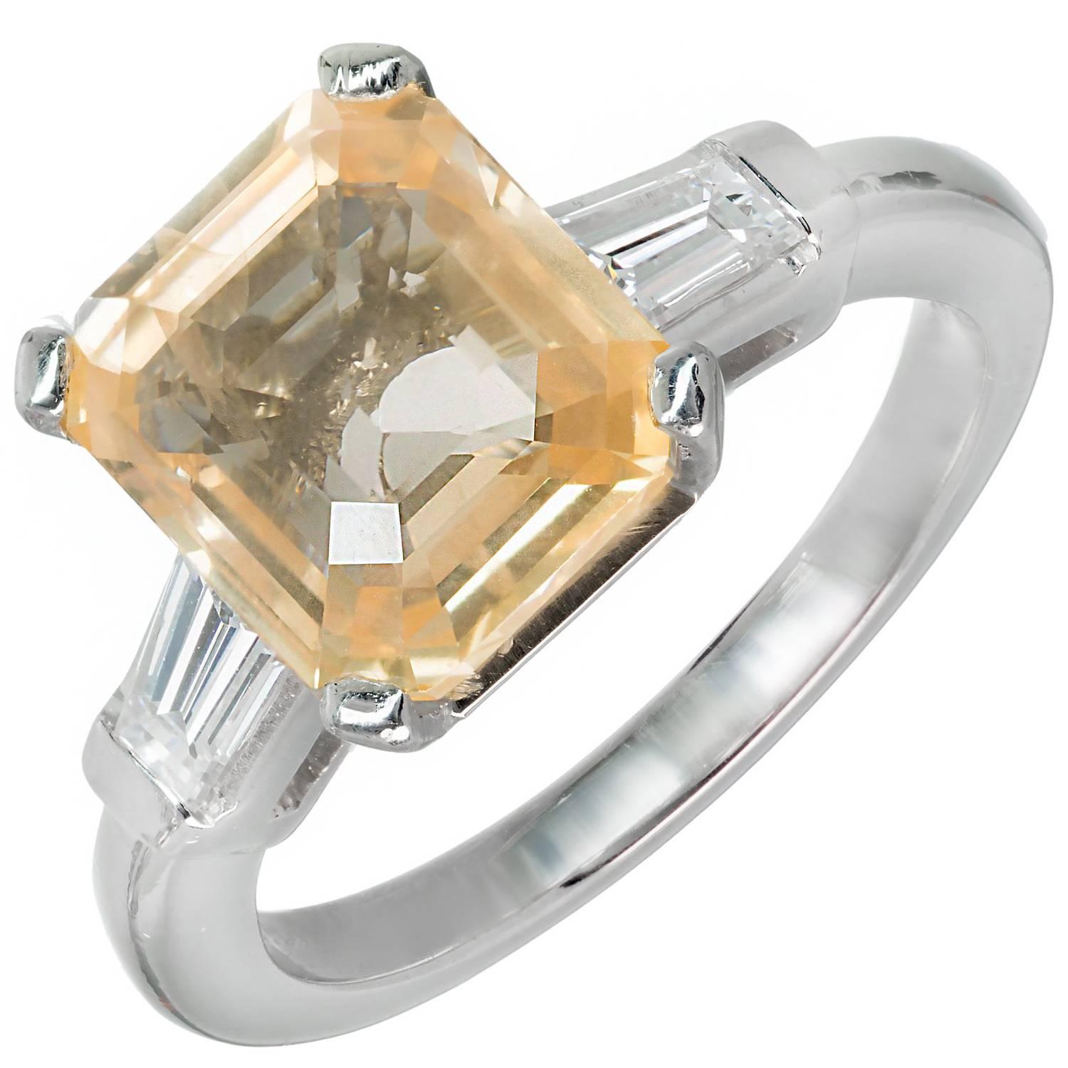  6.04 Carat Orange Yellow Emerald Cut Sapphire Diamond Platinum Engagement Ring For Sale
