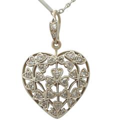 Antique Victorian 0.70 Carat Diamond and 12k Yellow Gold Pendant 9