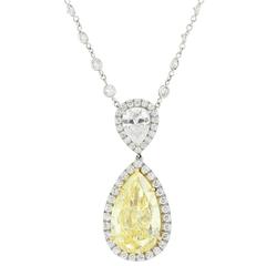 GIA Certified Fancy Intense Yellow Pear Shape Diamond 5.03 cts Pendant.