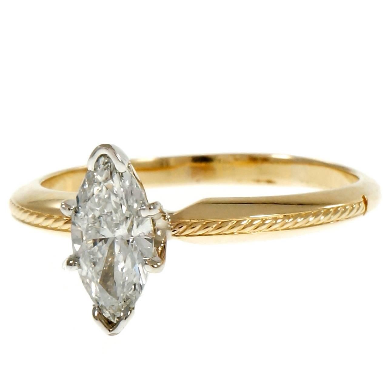 .80 carat Marquise diamond solitaire engagement ring in 14k yellow gold with a white gold top. GIA certified.

1 Marquise diamond, approx. total weight .80cts, F, SI2, GIA certificate #7213847115
Size 8.5 and sizable
14k yellow and white