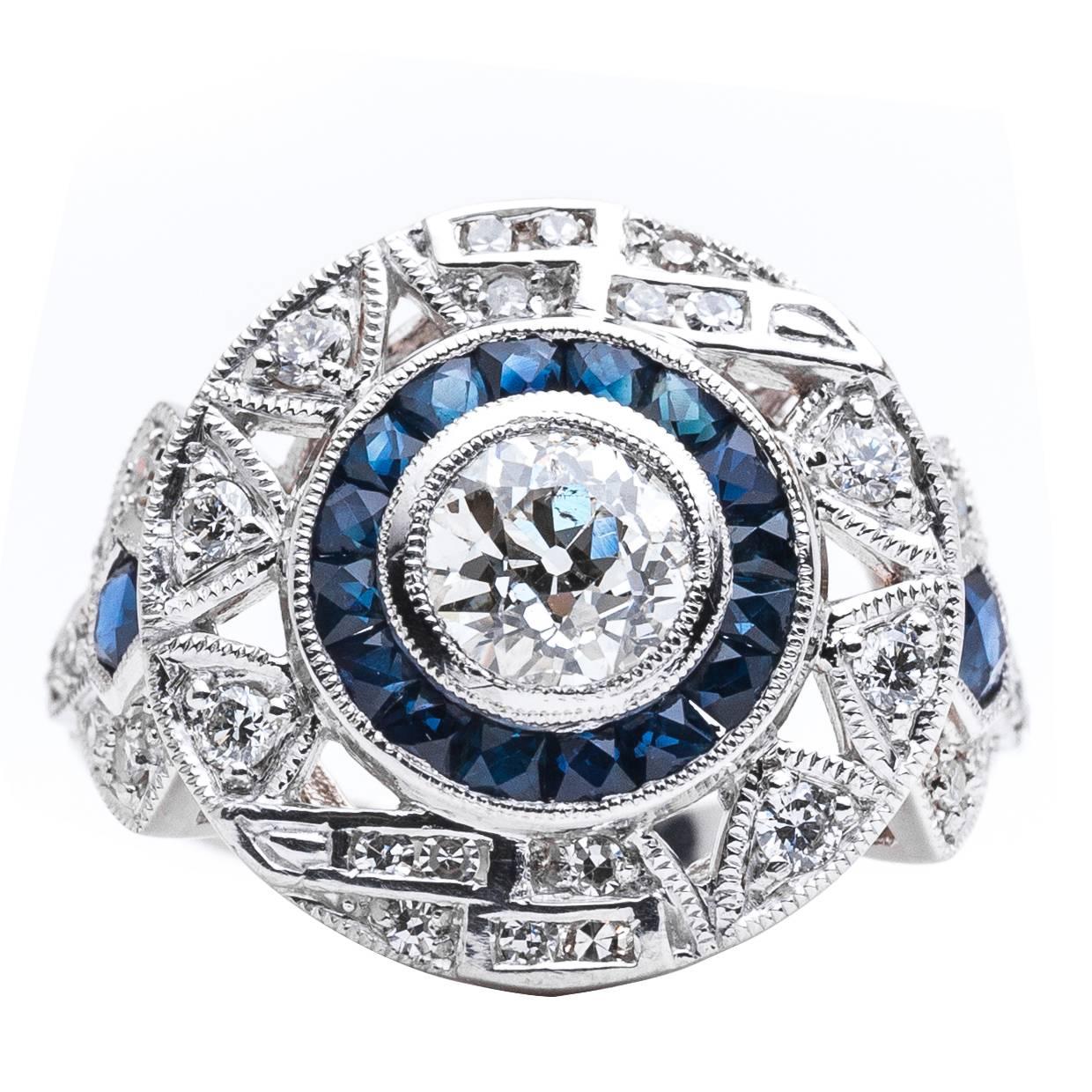 Dramatic 0.83 Carat Diamond and Sapphire platinum Target Ring For Sale