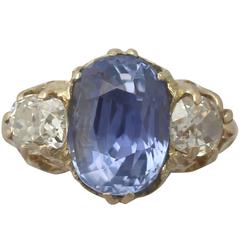 Antique 4.76 Carat Sapphire 1.05 Carat Diamond Yellow Gold Trilogy Ring