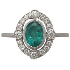 1940s 0.67 Carat Emerald and 0.42 Carat Diamond, White Gold Dress Ring 2