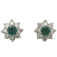 1980s 0.35 Carat Emerald and 0.40 Carat Diamond, White Gold Stud Earrings