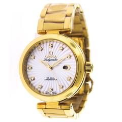 Omega Montre-bracelet automatique Ladymatic en or jaune pour femmes