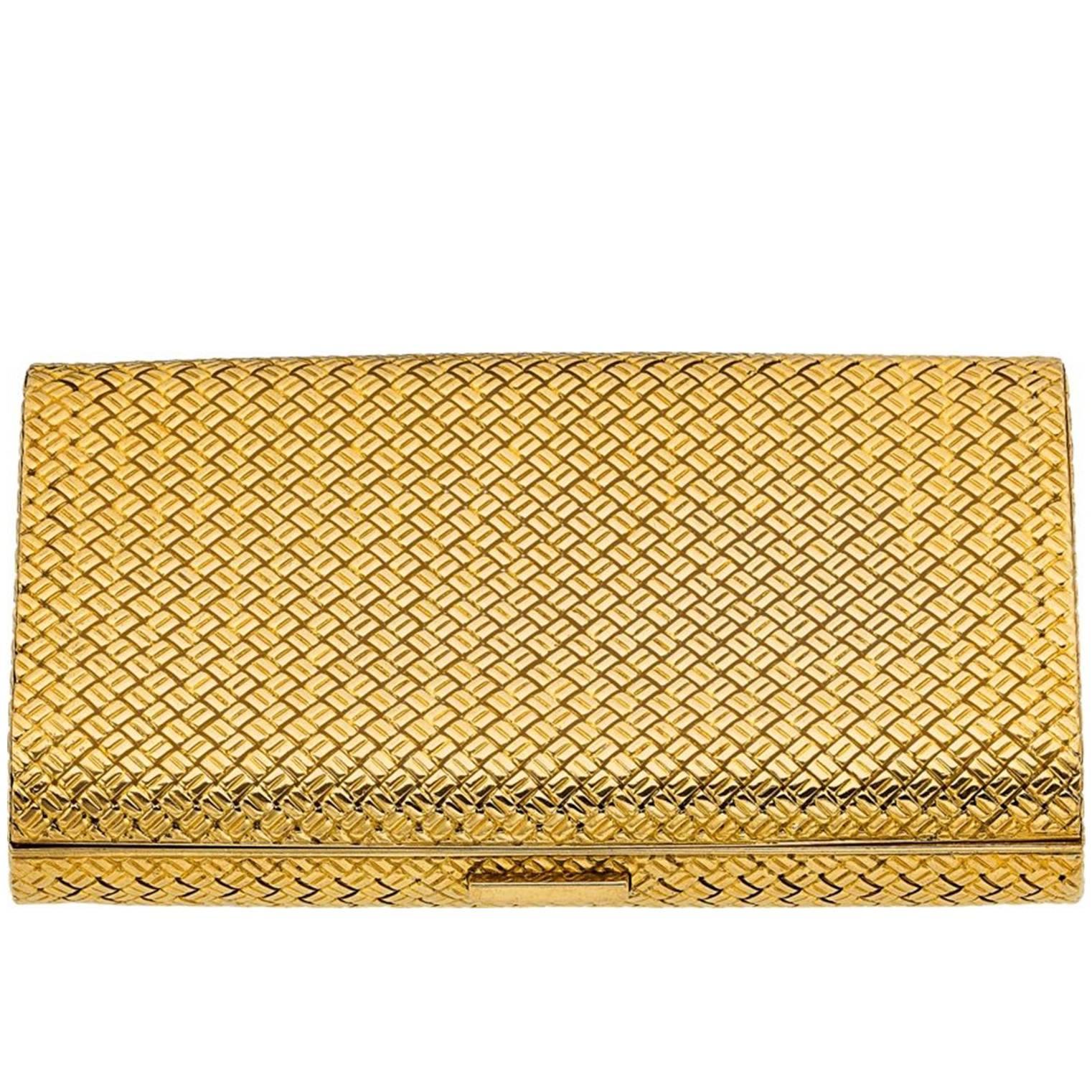 An impeccably crafted Necessaire compact case by Van Cleef & Arpels.  It has a special basket weave design in 18K yellow gold.  The case is versatile and easy to use to keep many different things inside!