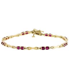Oval Ruby, Diamond and Gold Bracelet