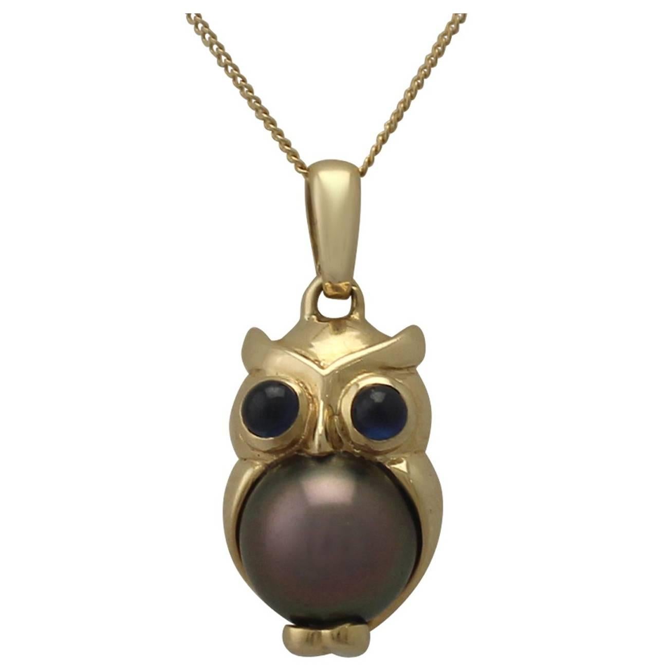 1970s Cultured Pearl and 0.21 Carat Sapphire, 18 k Yellow Gold 'Owl' Pendant