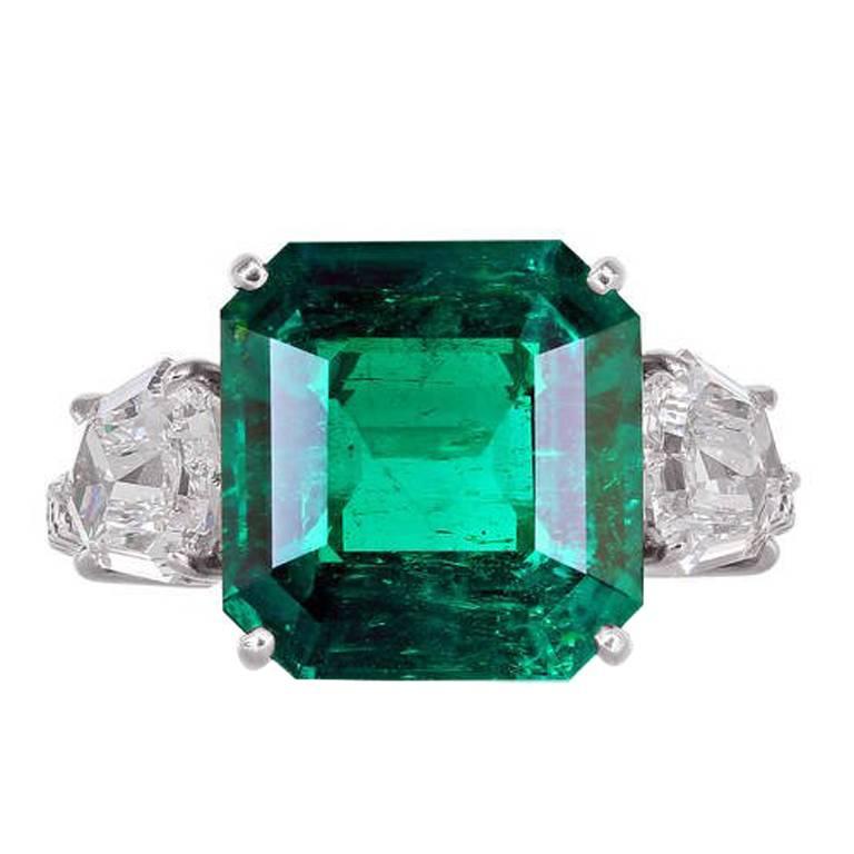 5.48 Carat Colombian Emerald Diamond Platinum Three Stone Ring For Sale