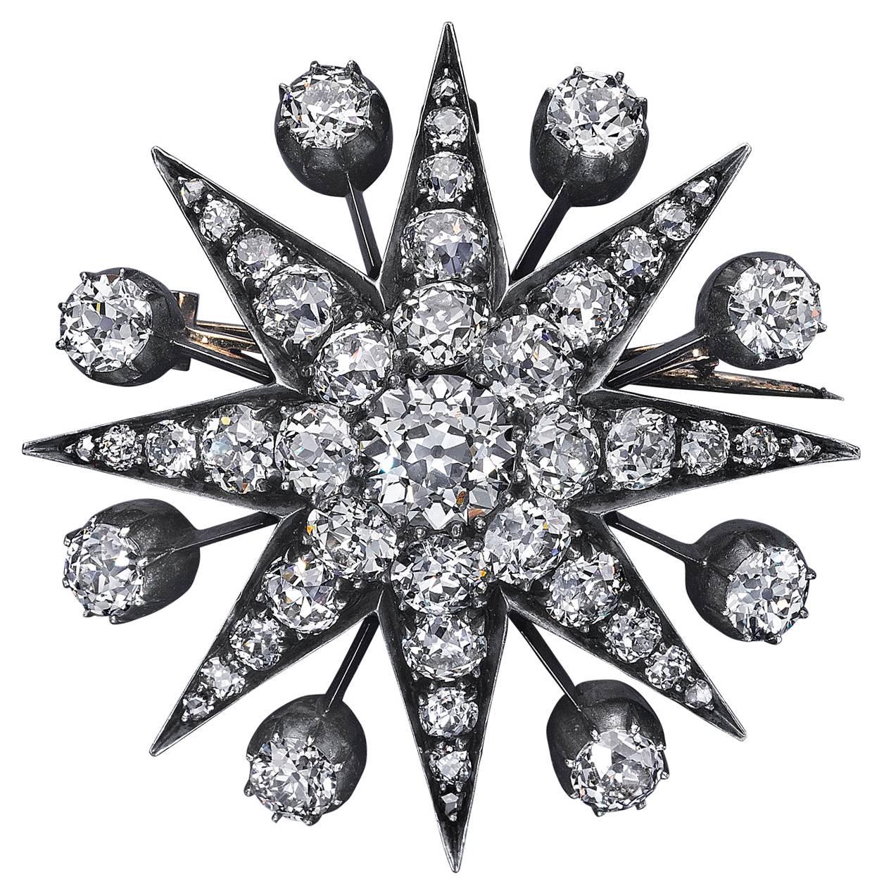 Victorian 12.50 Carats Total Old European Cut Diamond Eight Point Star Brooch For Sale