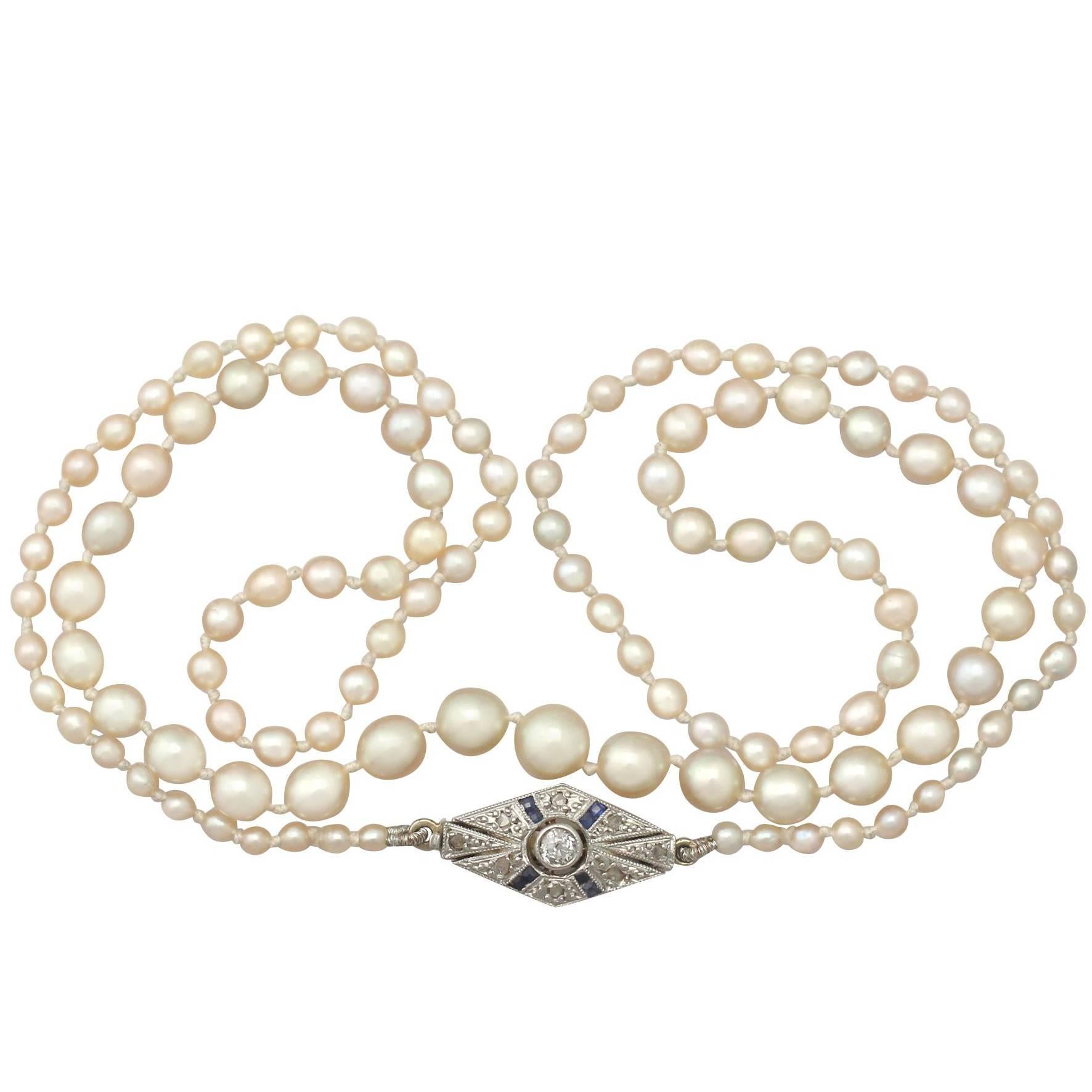 Natural Pearl Necklace with Diamond, Sapphire and Gold Clasp
