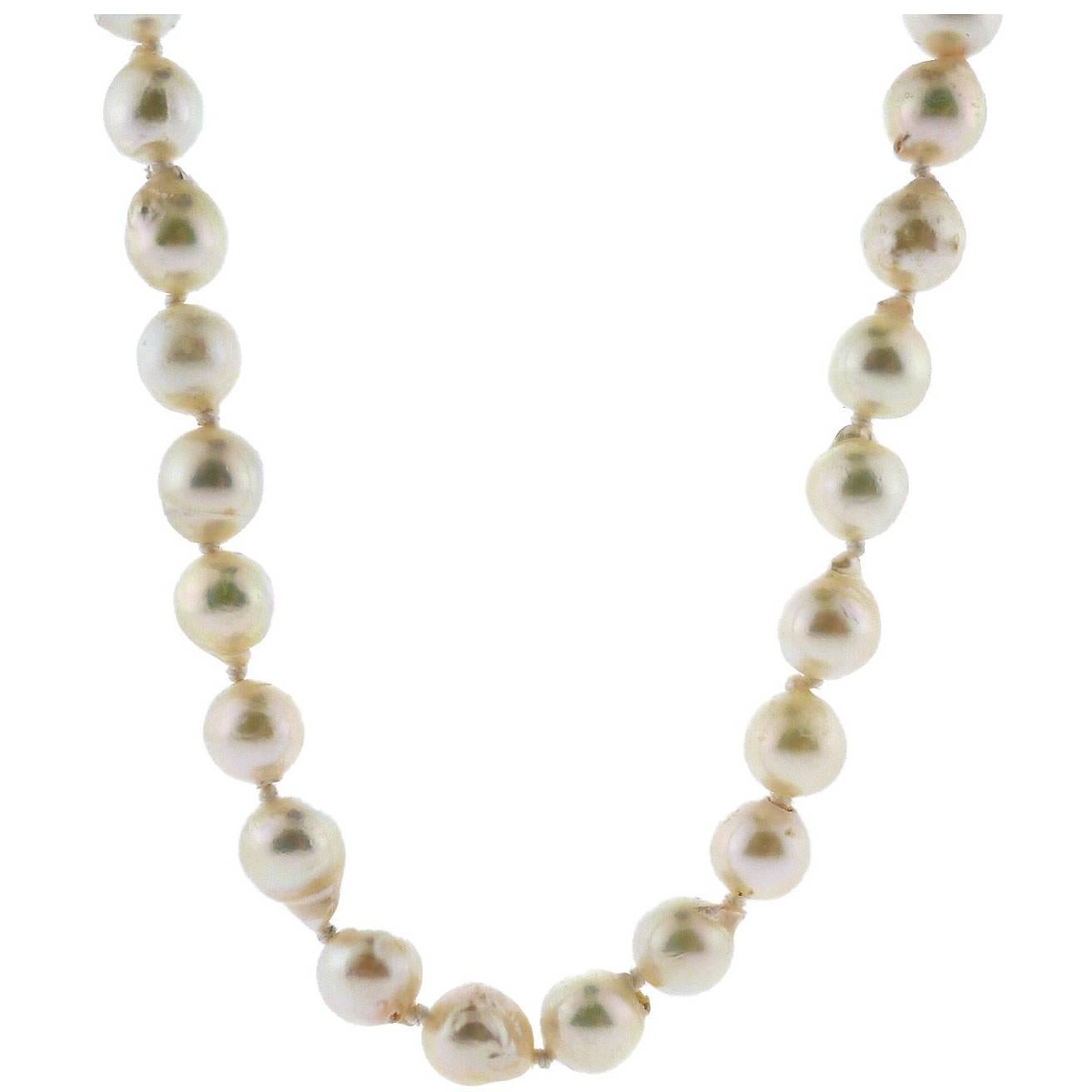 Opera Semi-Baroque Cultured Pearls with Gold Clasp For Sale