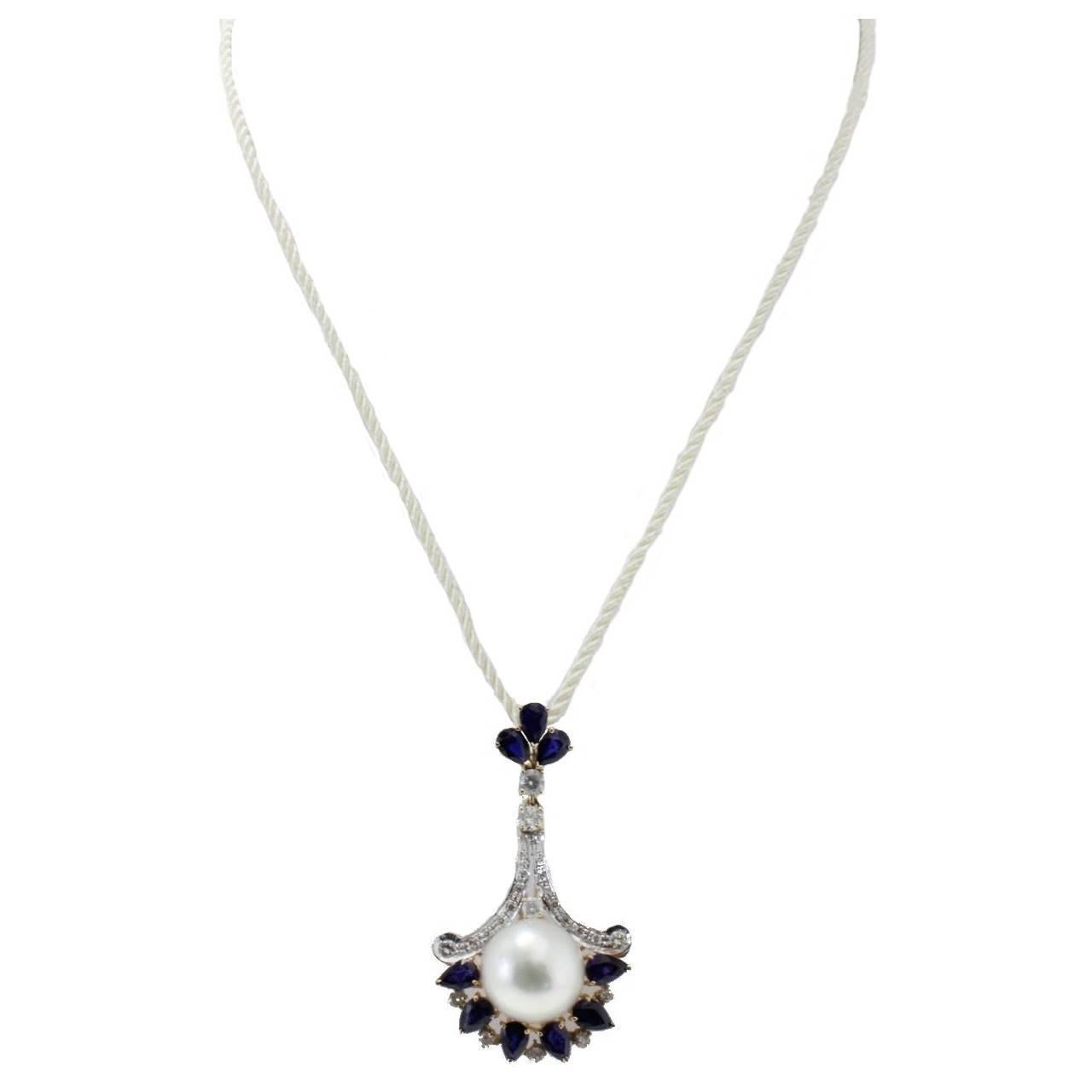 Diamonds Blue Sapphires and Pearl Pendant Gold Necklace For Sale at