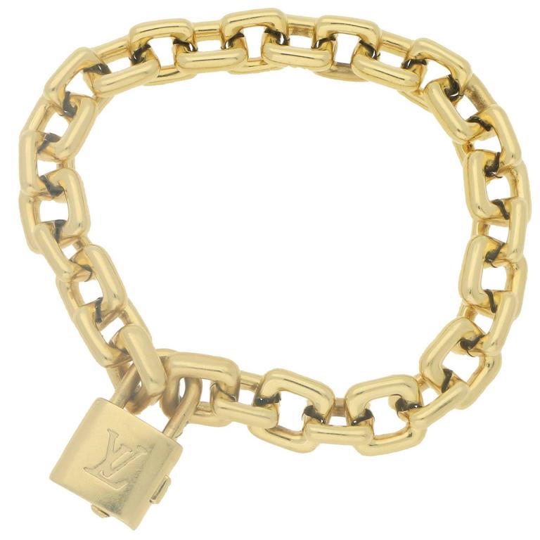 Vintage 18 Karat Gold Louis Vuitton Padlock Bracelet at 1stDibs