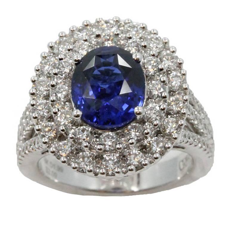 18 Karat White Gold Sapphire Ring with Diamonds For Sale