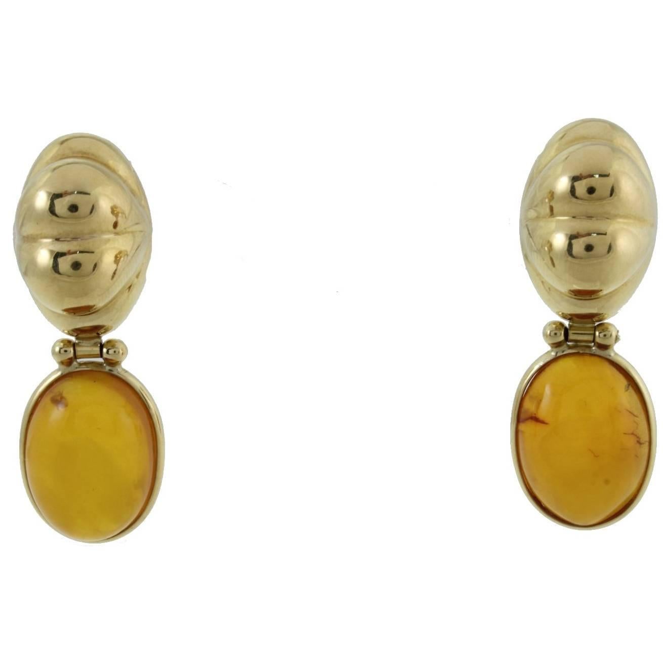 SHIPPING POLICY: 
No additional costs will be added to this order. 
Shipping costs will be totally covered by the seller (customs duties included).

Stud earrings in 18k  yellow gold mounted with amber.
Amber 3.60 gr
Tot.Weight 10.40 gr
R.F icc

For