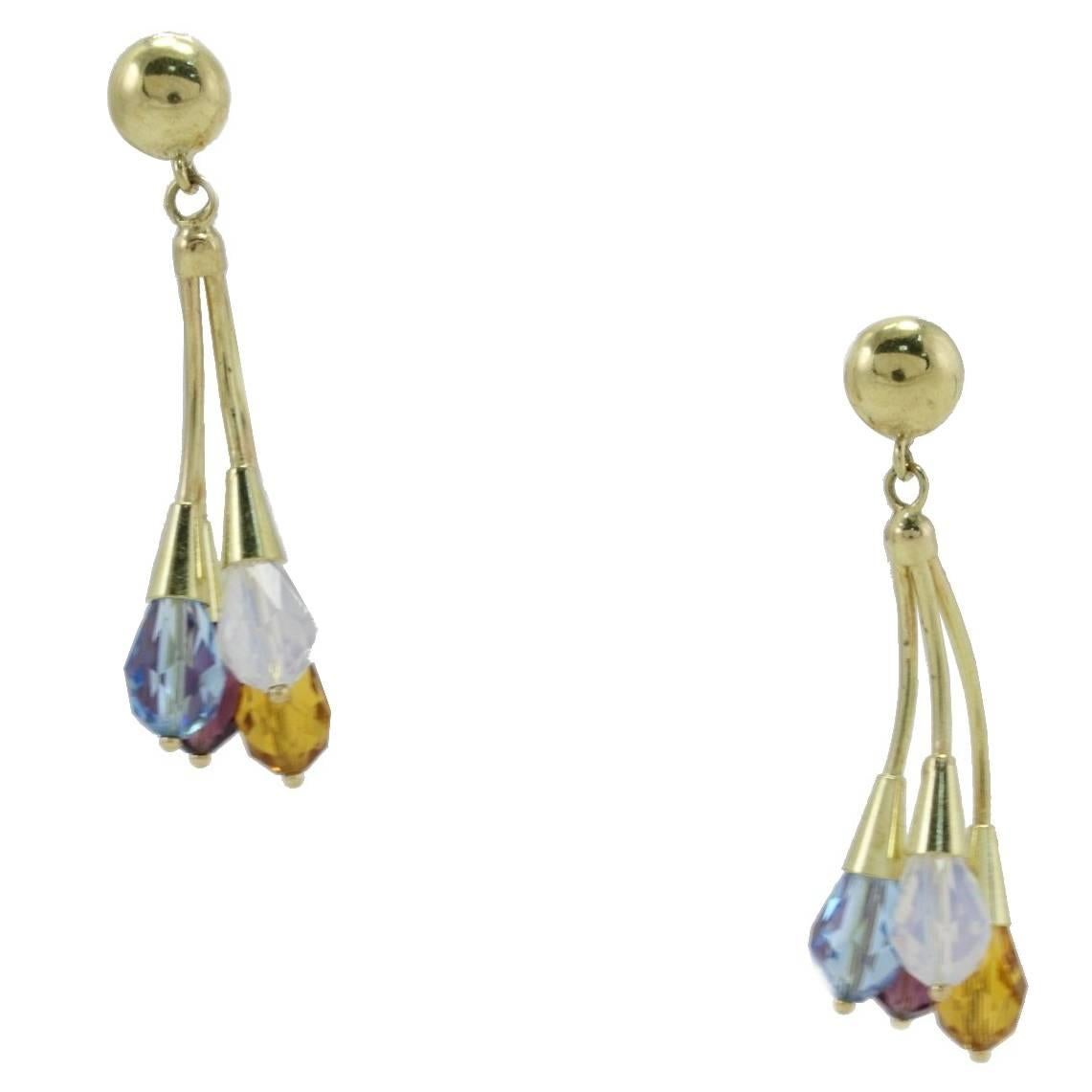 Dangle earrings in 18k yellow gold with four colored stones each.
Tot.Weight 8.60 gr
Ref gief