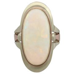 1950s 6.91 Carat Opal Yellow and Rose Gold Cocktail Ring