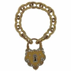 Vintage Continental Gold Diamond Turquoise Padlock Charm Bracelet