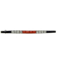 Art Deco Onyx, Diamond, Coral Brooch, circa 1920 1