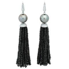 176.50 Carat Diamond and South Sea Pearl Earrings