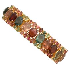 1980s 96.65 Carat Tourmaline Peridot Yellow Gold Bracelet 9