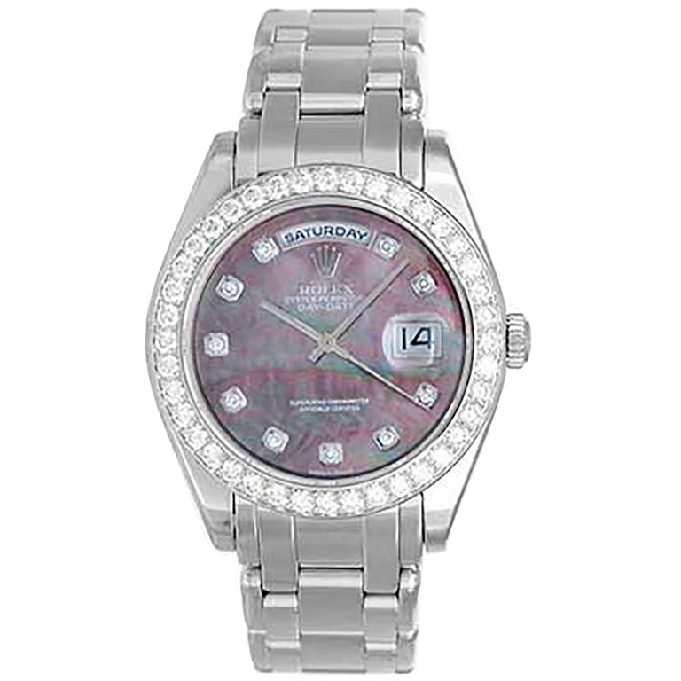 rolex day date platinum on wrist