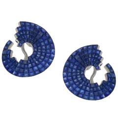 Sapphire Invisibly Set Swirl Earrings