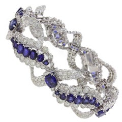 Vintage c 17, 95 Sapphire and ct 9, 85 Diamond Gold Clamper Bracelet